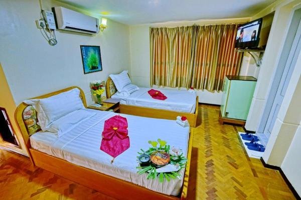 Фото Taim Phyu Hotel