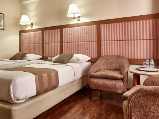 Фото Grand Menteng Hotel