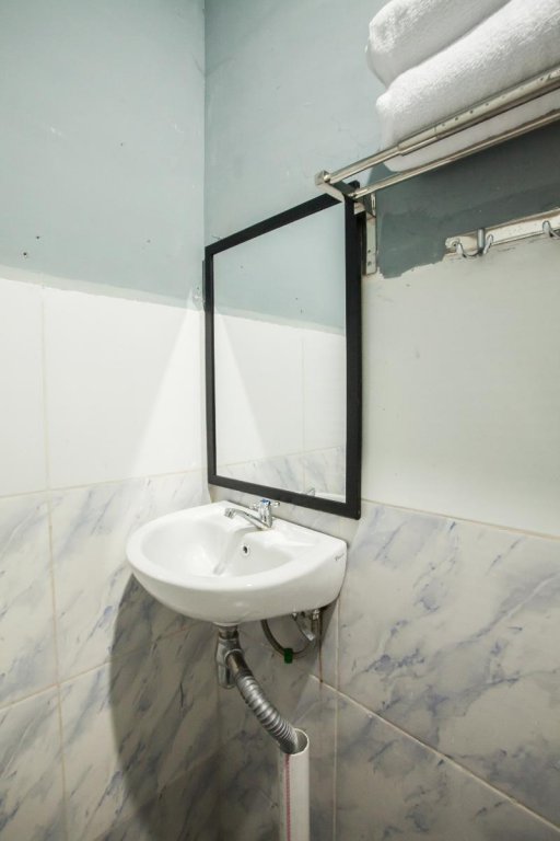 Фото Oyo 990 Stadion Residence Syariah