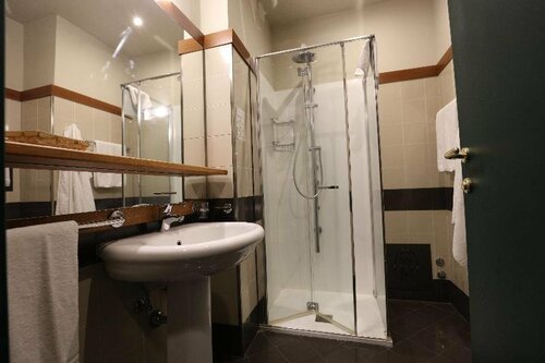 Гостиница Grande Albergo Maugeri в Ачиреале