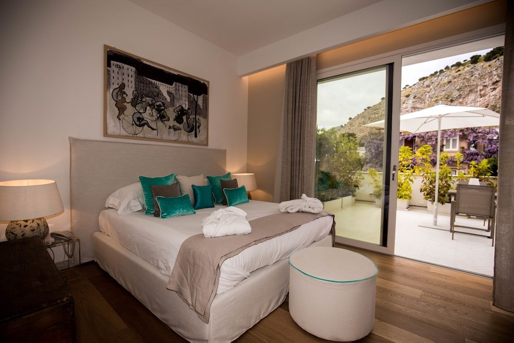 Фото Unìco Boutique Hotel d'Arte