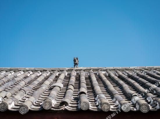 Фото Li Jiang Hemuju Inn