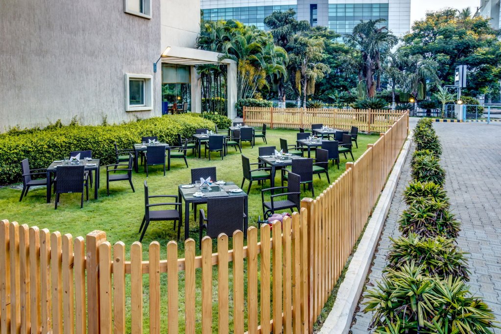 Фото Radha Hometel Whitefield