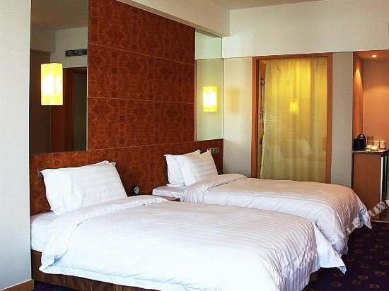 Фото Ramada Plaza Pu Dong South Shanghai