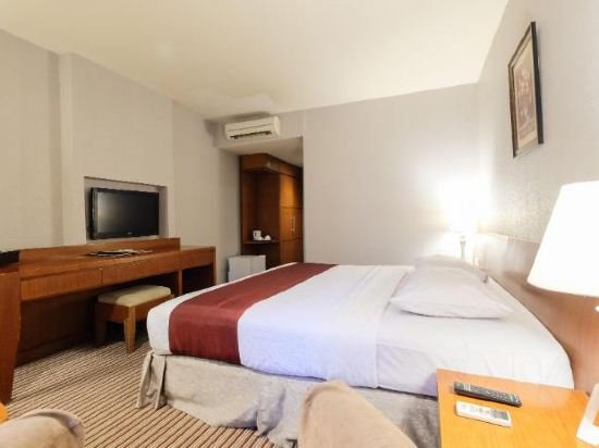 Фото Kenari Tower Hotel