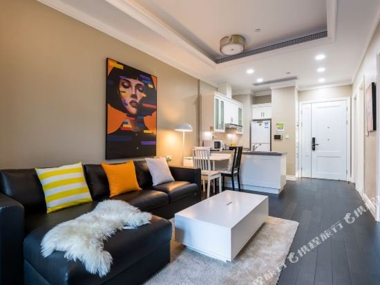 Фото Shanghai Xinchuan Boutique Apartment