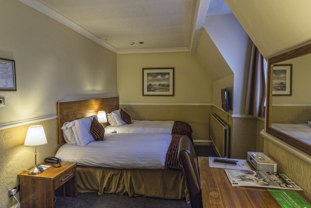 Фото Econo Lodge Truman Inn