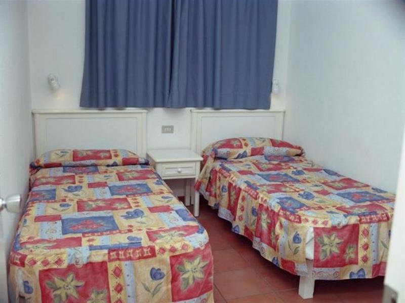 Фото Apartamentos Puerto Bello