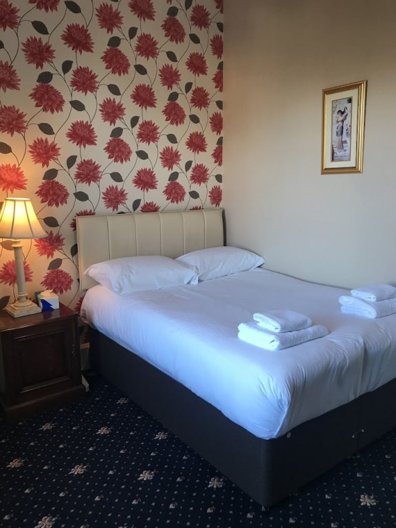 Фото The Alexander Guest House