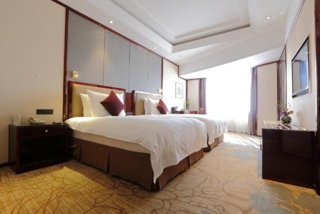 Фото Shaoxing Xianheng Grand Hotel