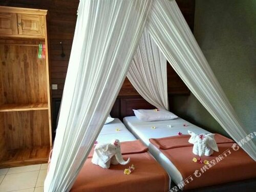 Гостиница Suka Sari Cottages Pemuteran