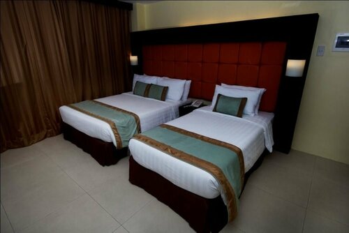 Гостиница Mango Suites - Tuguegarao в Провинции Кагаян