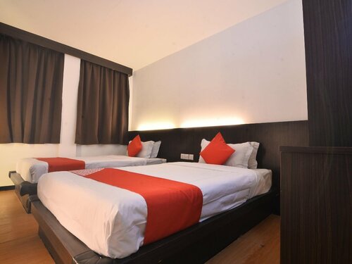 Гостиница Oyo 43960 Laksamana Executive & Boutique Hotel в Тавау
