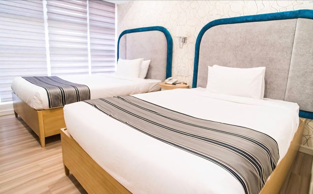 Фото Queen Margarette Hotel - Downtown