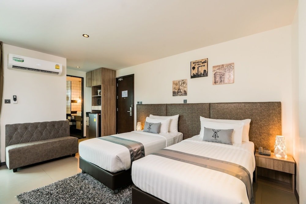 Фото T Pattaya Hotel