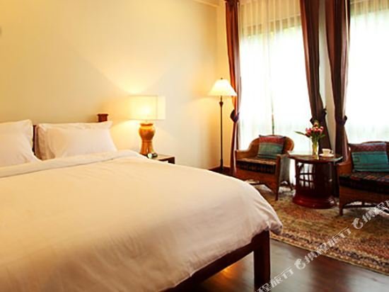 Фото Baan Klang Wiang Boutique Hotel Chiang Mai