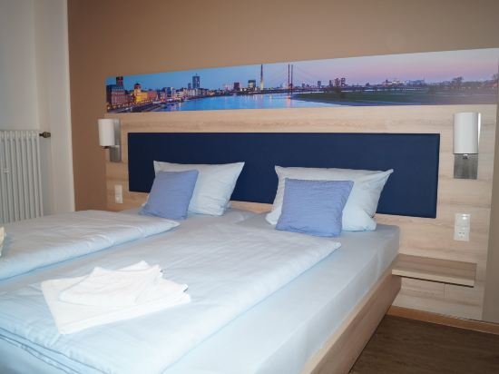 Фото Hotel Am Vogelsanger Weg