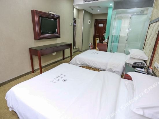 Фото Tai Xiang Business Inn