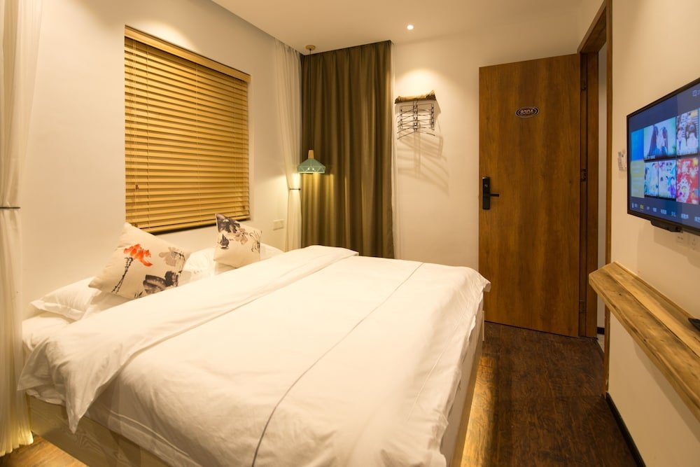 Фото Xiamen Feisu Tianchunshe Holiday Villa