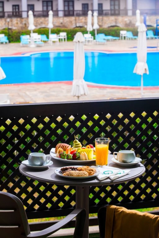 Фото Nostos Beach Boutique Hotel