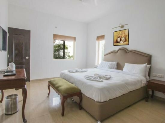 Гостиница Capital O 33435 Arbor Casa Ahaana