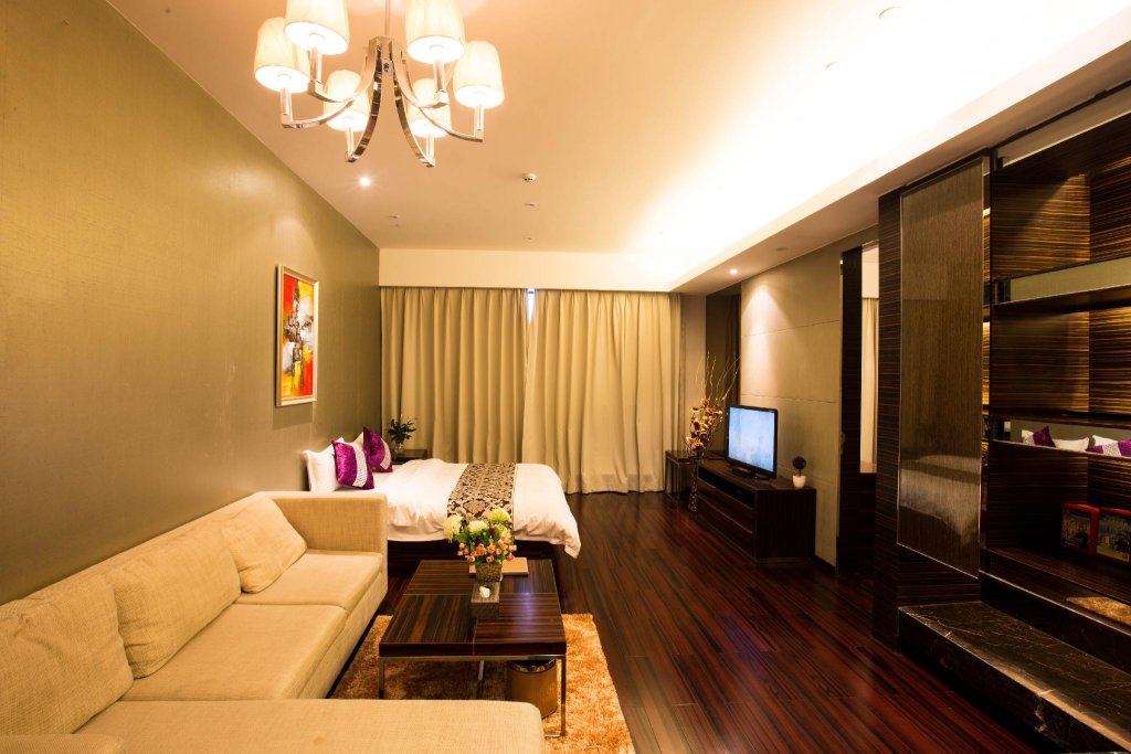 Фото Xingyi International Hotel Poly Store