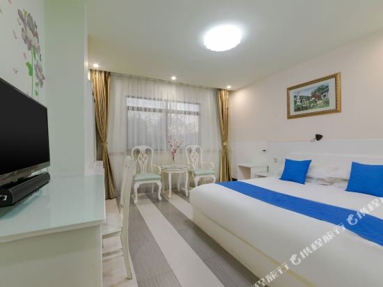 Фото Shanghai Blue House Business Hotel