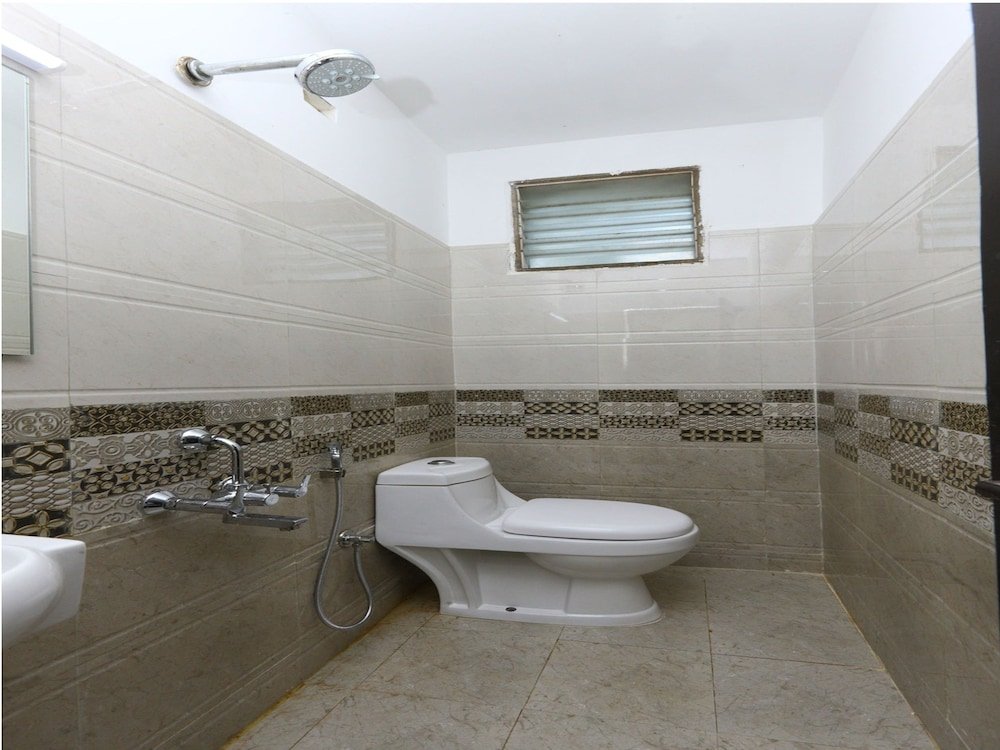 Фото Oyo 9372 Rich Inn