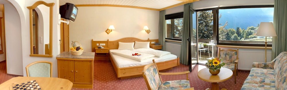 Фото Naturhotel Taleu