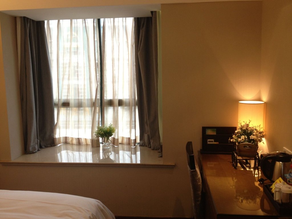 Фото Yiwu Wendemu International Hotel