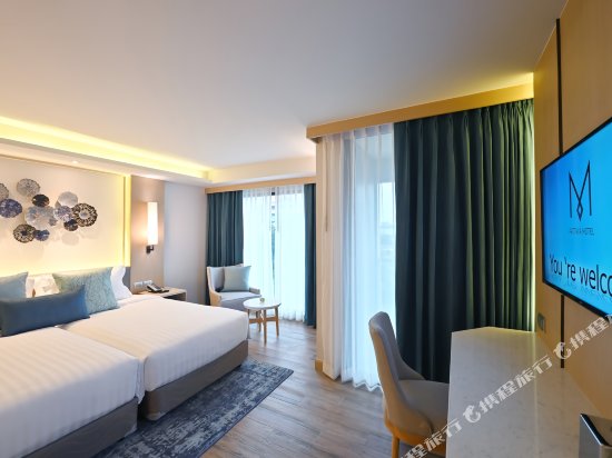 Фото M Pattaya Hotel
