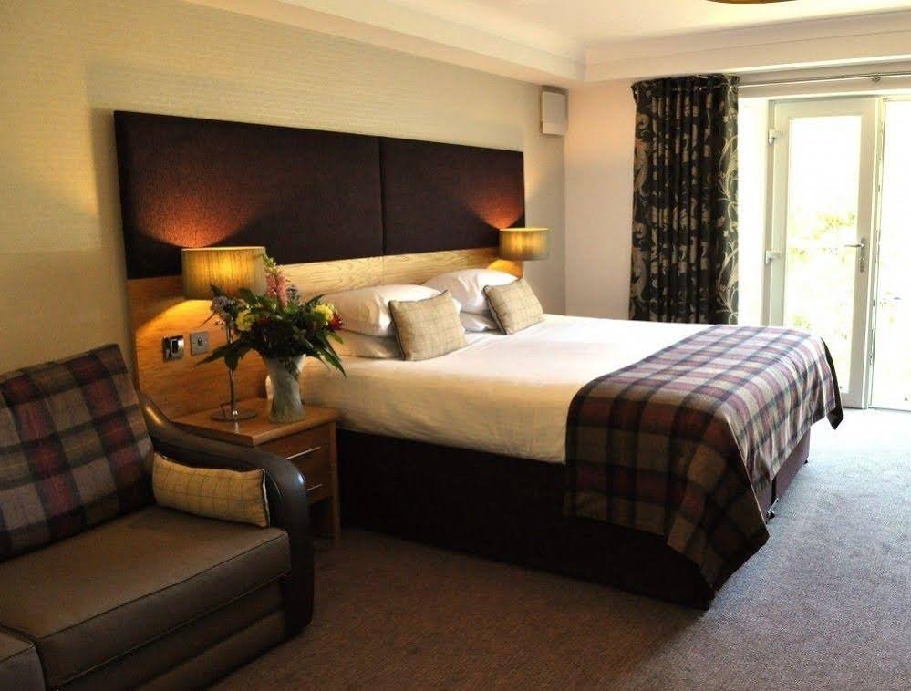 Фото Craigmhor Lodge & Courtyard