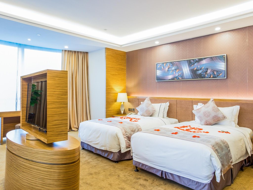 Фото Shenzhen Baoan Plus Gems Cube Hotel