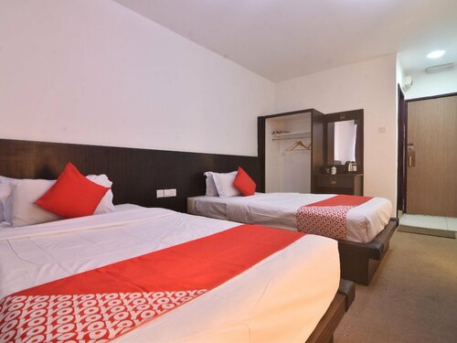 Гостиница Oyo 43960 Laksamana Executive & Boutique Hotel в Тавау