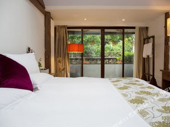 Фото Merry Inn Lijiang