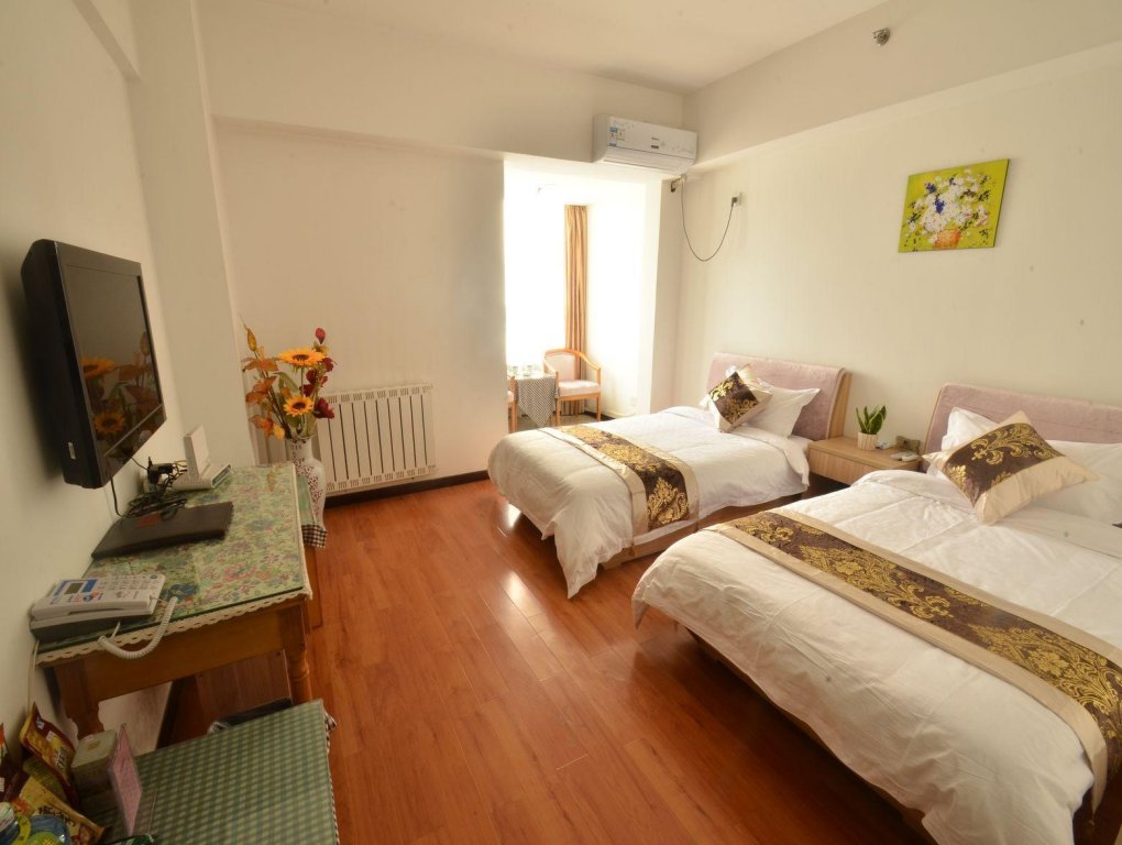 Фото Xian Golden Tree Business Hotel