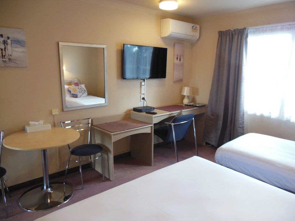 Фото Asure Camelot Arms Motor Lodge