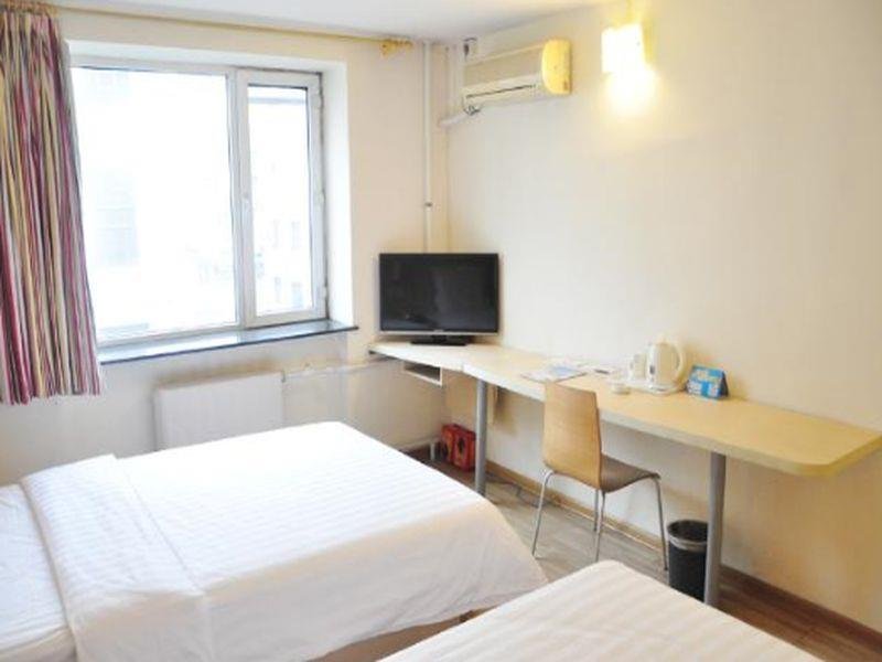 Фото 7 Days Inn Harbin Railway Station Qiulin Shop