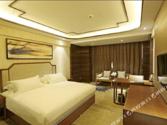 Фото Caifu Holiday Hotel