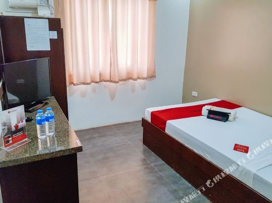 Фото RedDoorz @ Caimito Drive Dampas