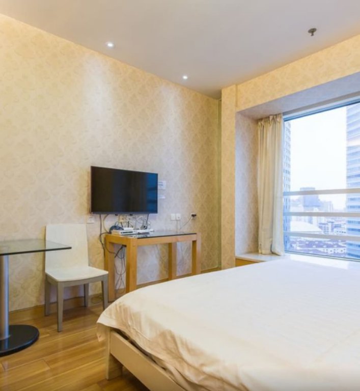 Фото Shanghai Yueyi Apartment Hotel