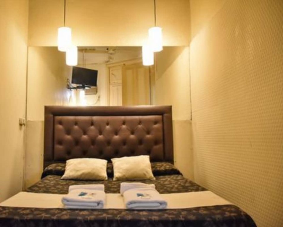 Фото Casi Guemes Hotel