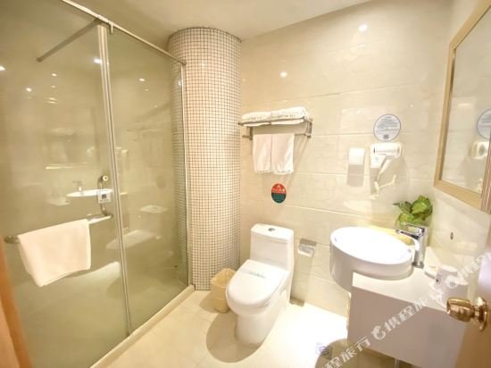 Фото GreenTree Inn Tianjin Xiqing District Xiuchuan Road Sunshine 100 Express Hotel