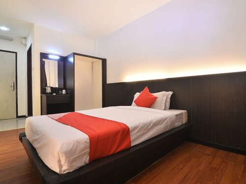 Гостиница Oyo 43960 Laksamana Executive & Boutique Hotel в Тавау