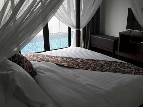 Гостиница Holiday Villa Pantai Indah