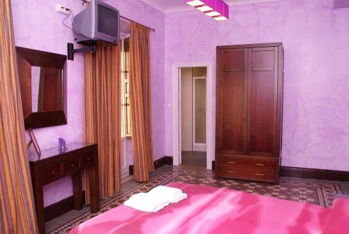 Фото La Perla Granada Suites