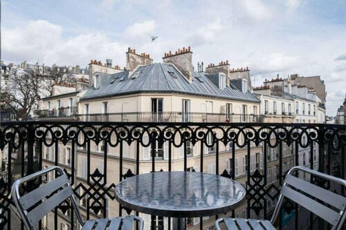 Апартаменты Appartement confortable à Montmartre Paris в Париже