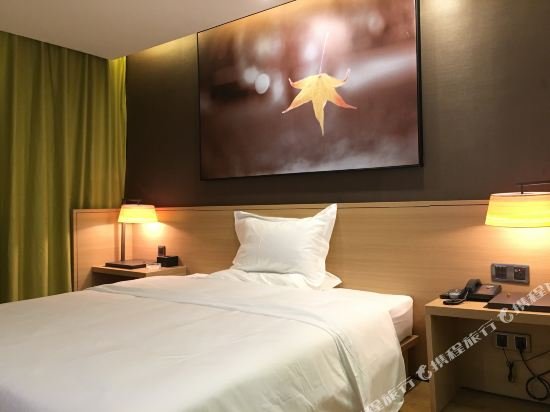 Фото Iu Hotels·Shangri-La Bus Terminal Songzanlin Temple