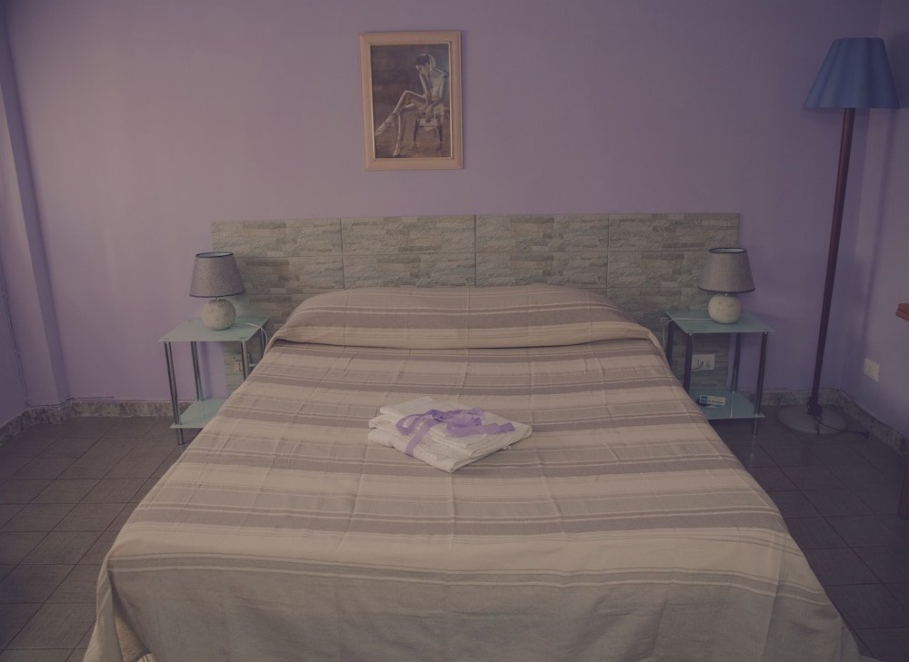 Фото Cassiodoro Rooms Affittacamere