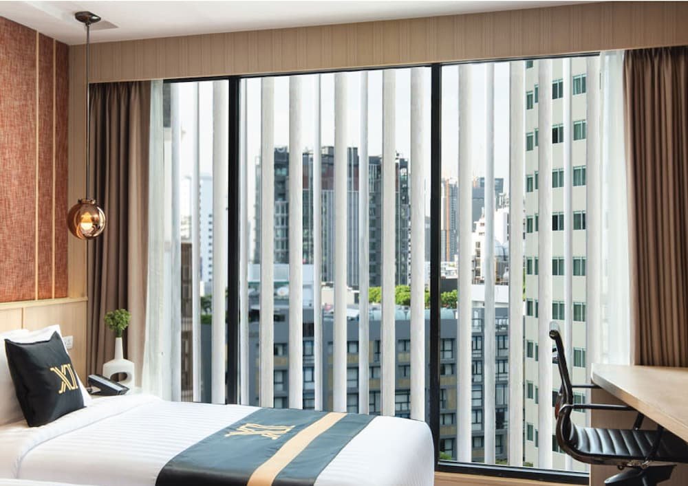 Фото Eleven Avenue Suites Bangkok